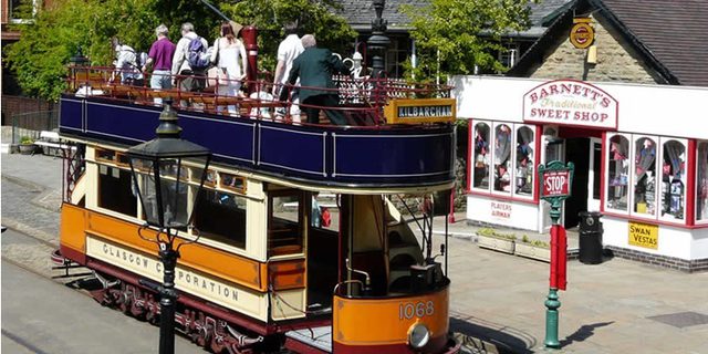 Crich Tramway village open top tram and sweet shop